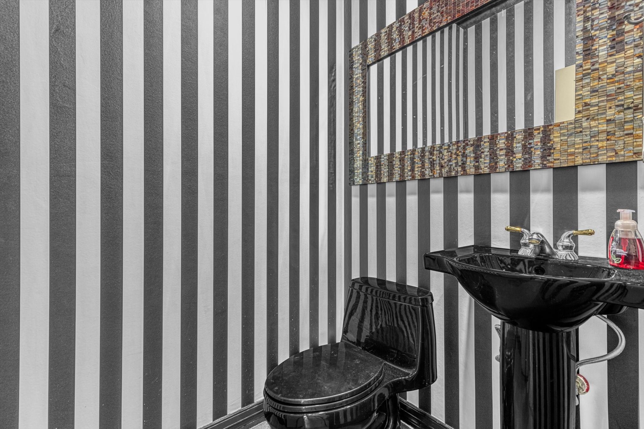 18422 Bivens Bend Spring, TX 77379 - Photo 43 of 50 a bathroom with a sink a toilet and chair