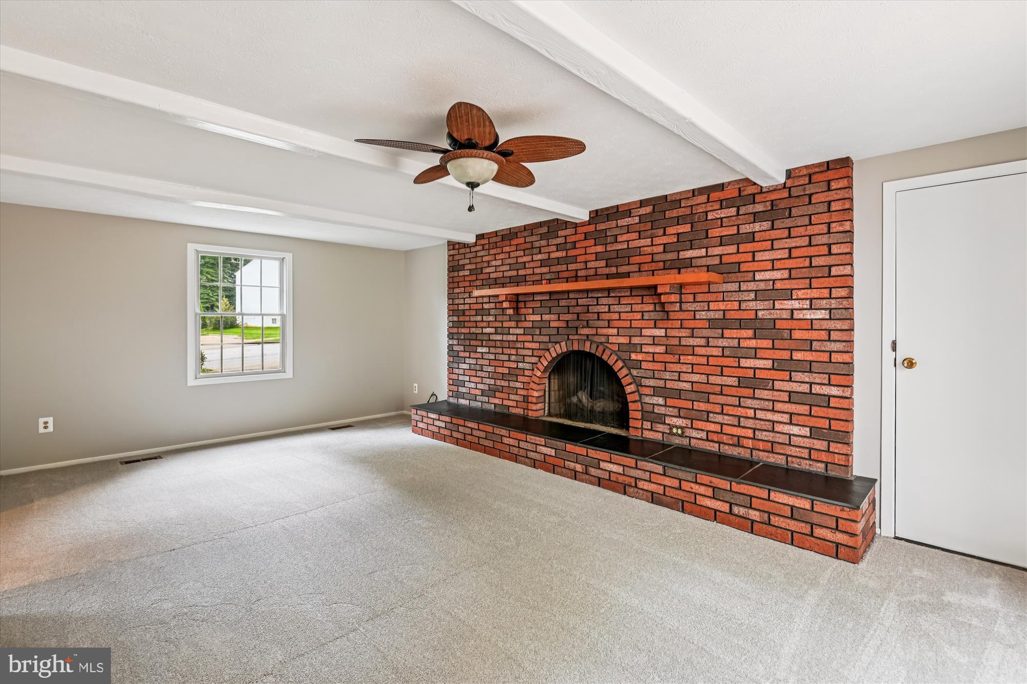 478 Bay Green Drive Arnold, MD 21012 - Photo 13 of 42 a view of empty room with fireplace and fan