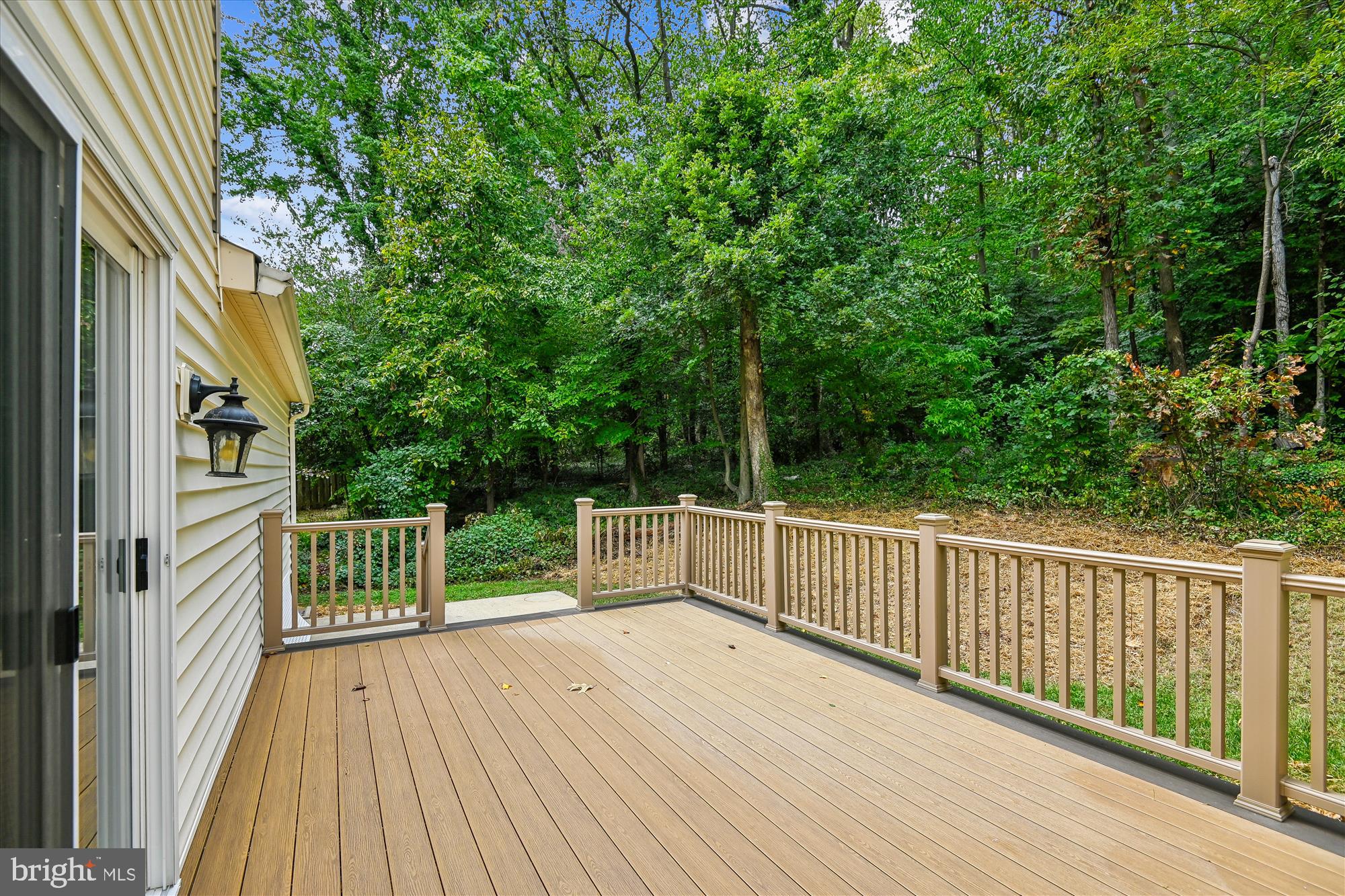 478 Bay Green Drive Arnold, MD 21012 - Photo 28 of 42 a view of a wooden deck and a yard