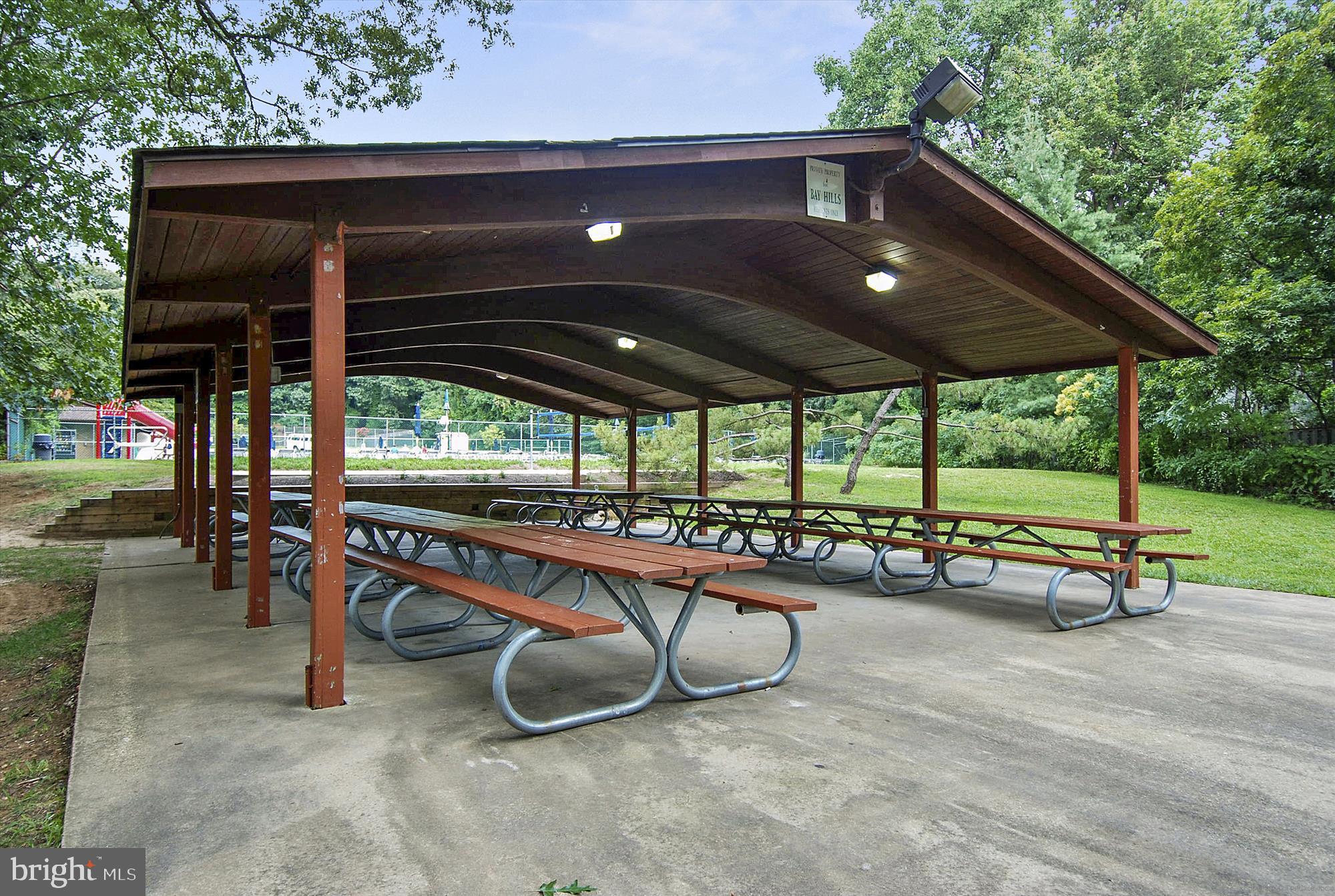 478 Bay Green Drive Arnold, MD 21012 - Photo 33 of 42 an outdoor sitting area with a table and chairs