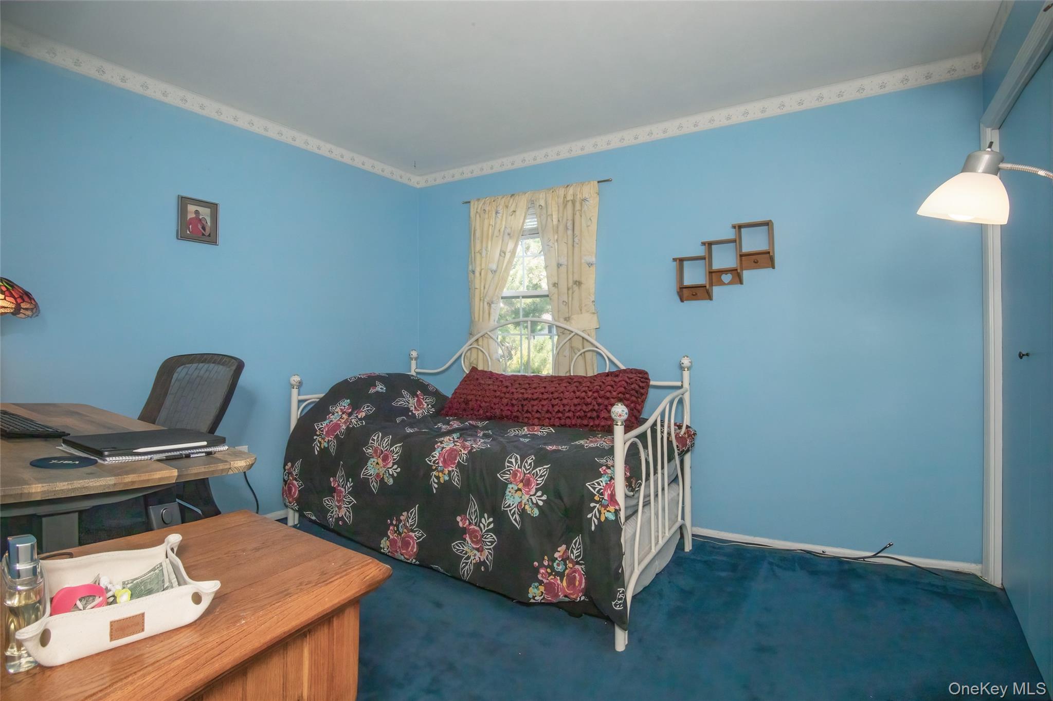 46 The Rise Warwick, NY 10990 - Photo 13 of 22 a bed sitting in a bedroom next to a window