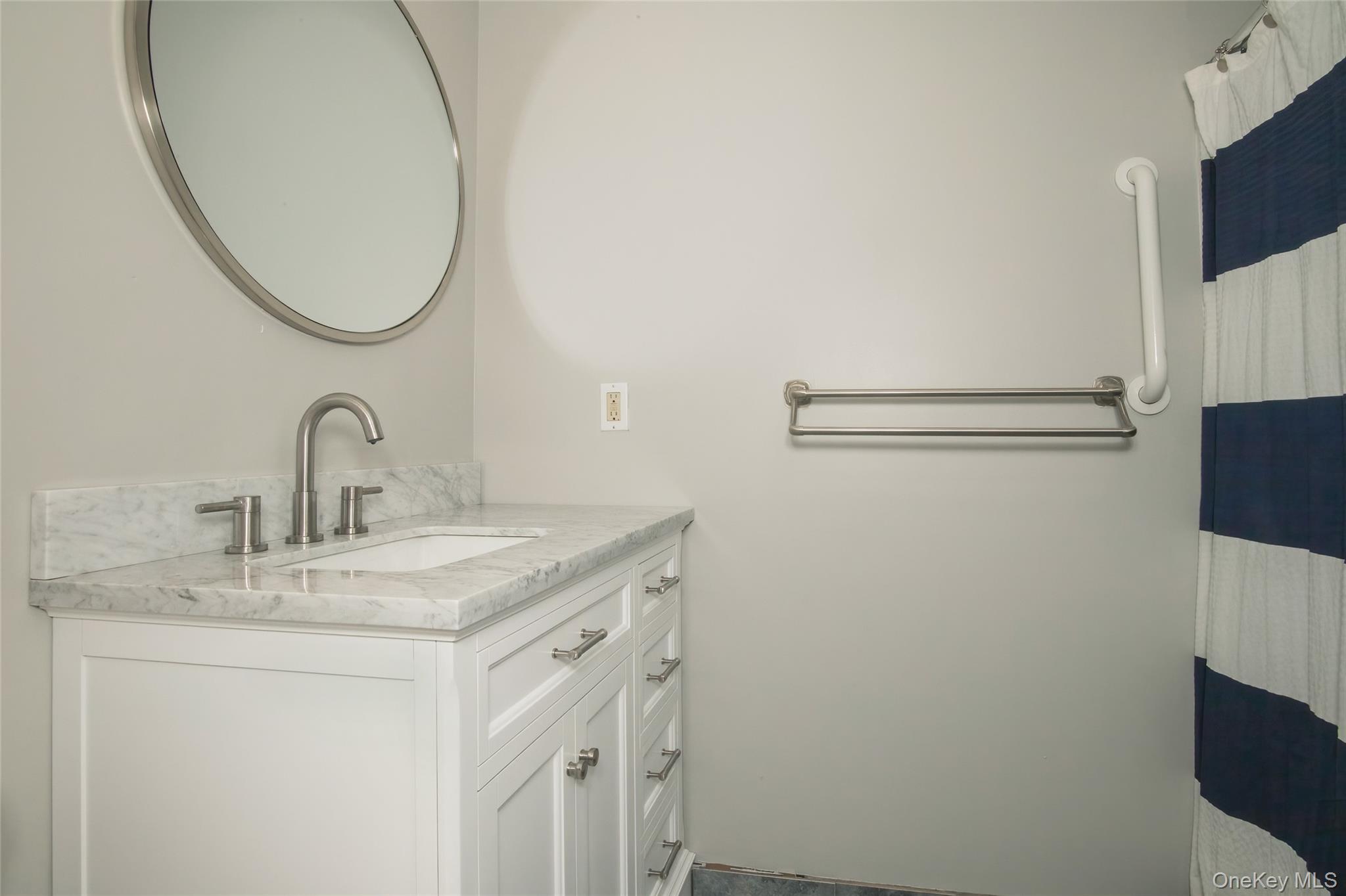 46 The Rise Warwick, NY 10990 - Photo 15 of 22 a bathroom with a sink and a mirror