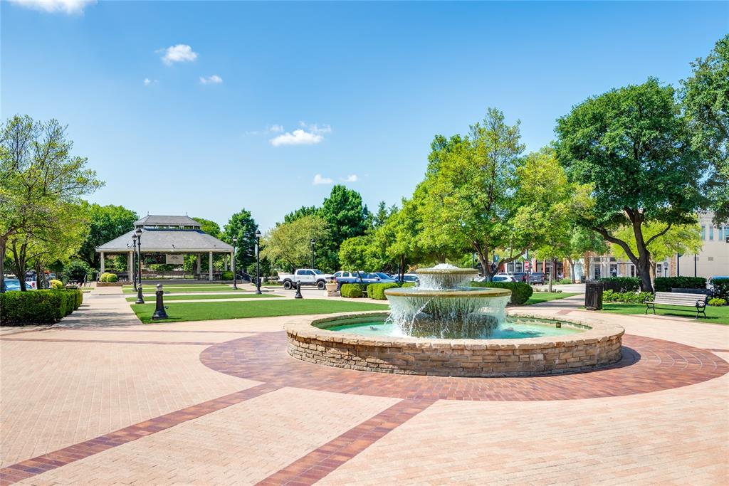 1530 Meeting Street, Unit 1308 Southlake, TX 76092 - Photo 18 of 40 a view of a fountain in front of a house