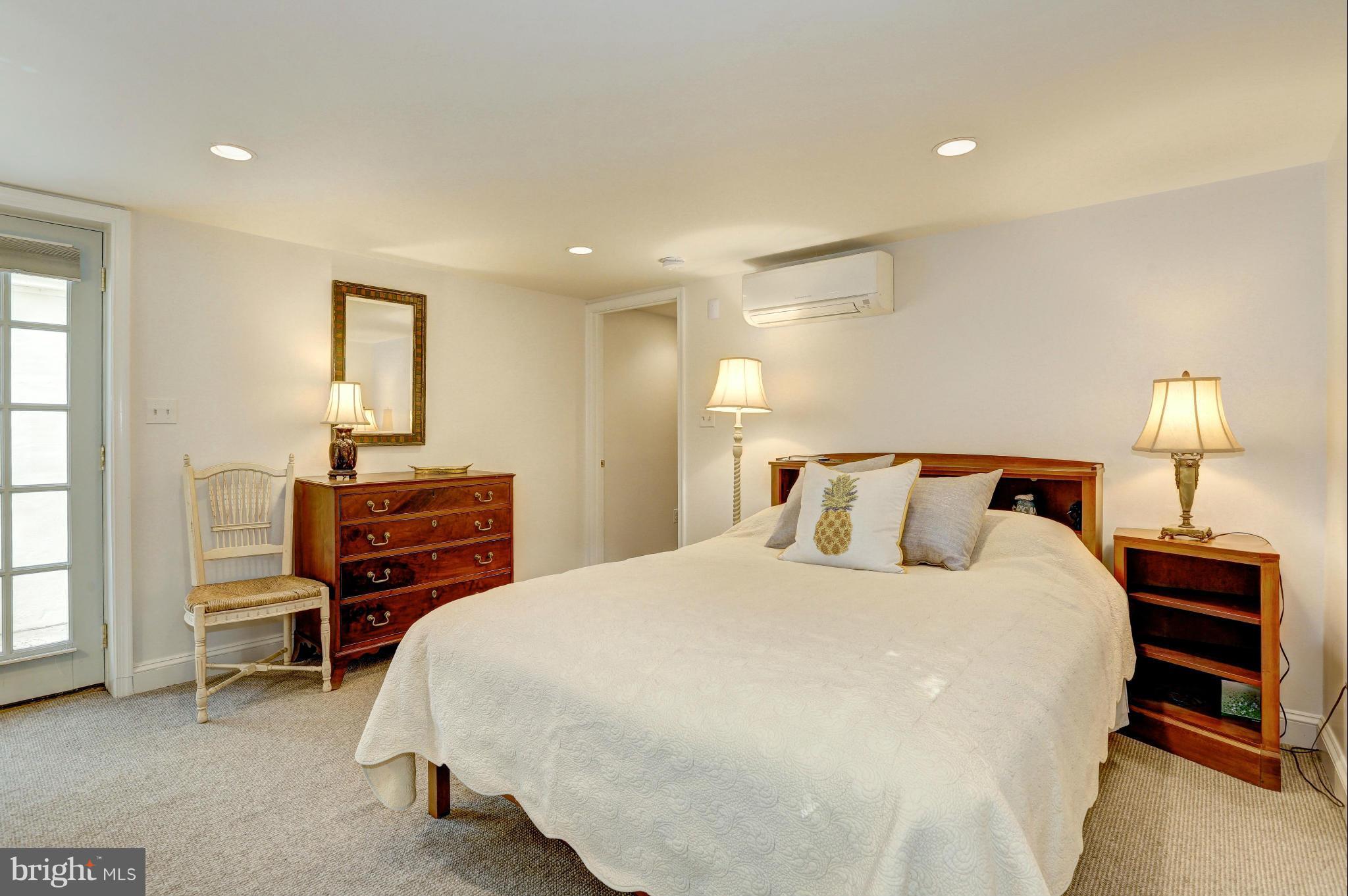 5302 Wriley Road Bethesda, MD 20816 - Photo 28 of 30 LL Bedroom #5 with full-light terrace entry.