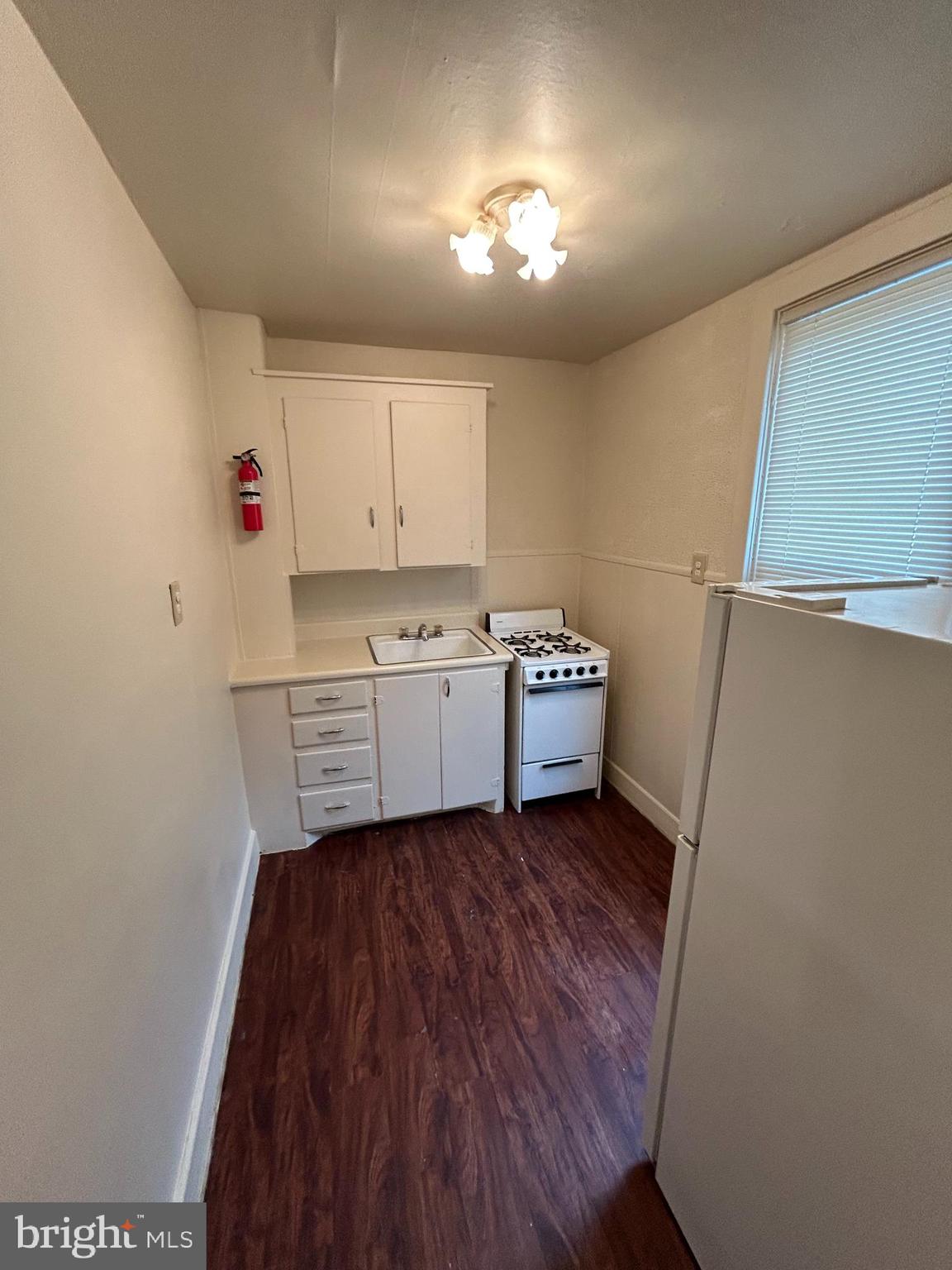 1001 Chestnut Street, Unit 8 Lebanon, PA 17042 - Photo 3 of 5 a view of kitchen and wooden floor