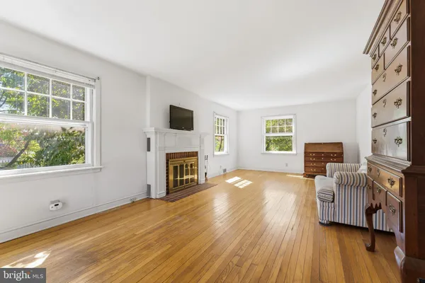 a view of livingroom with furniture and a fireplace