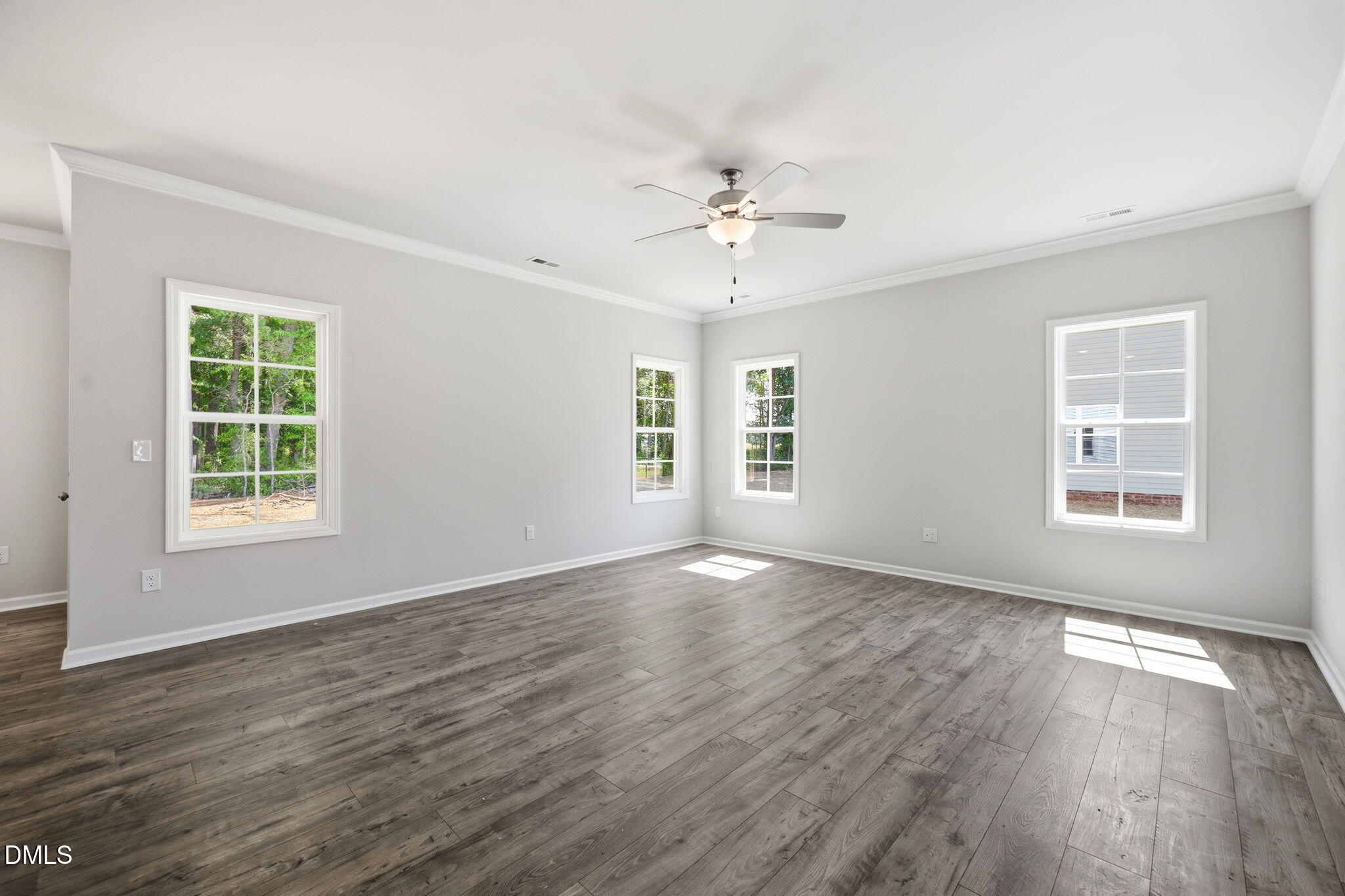191 Nectar Lane Bunnlevel, NC 28323 - Photo 13 of 35 a view of empty room with wooden floor and fan