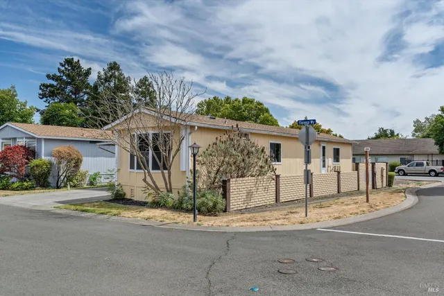 front view of a house with a street