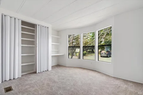 an empty room with windows