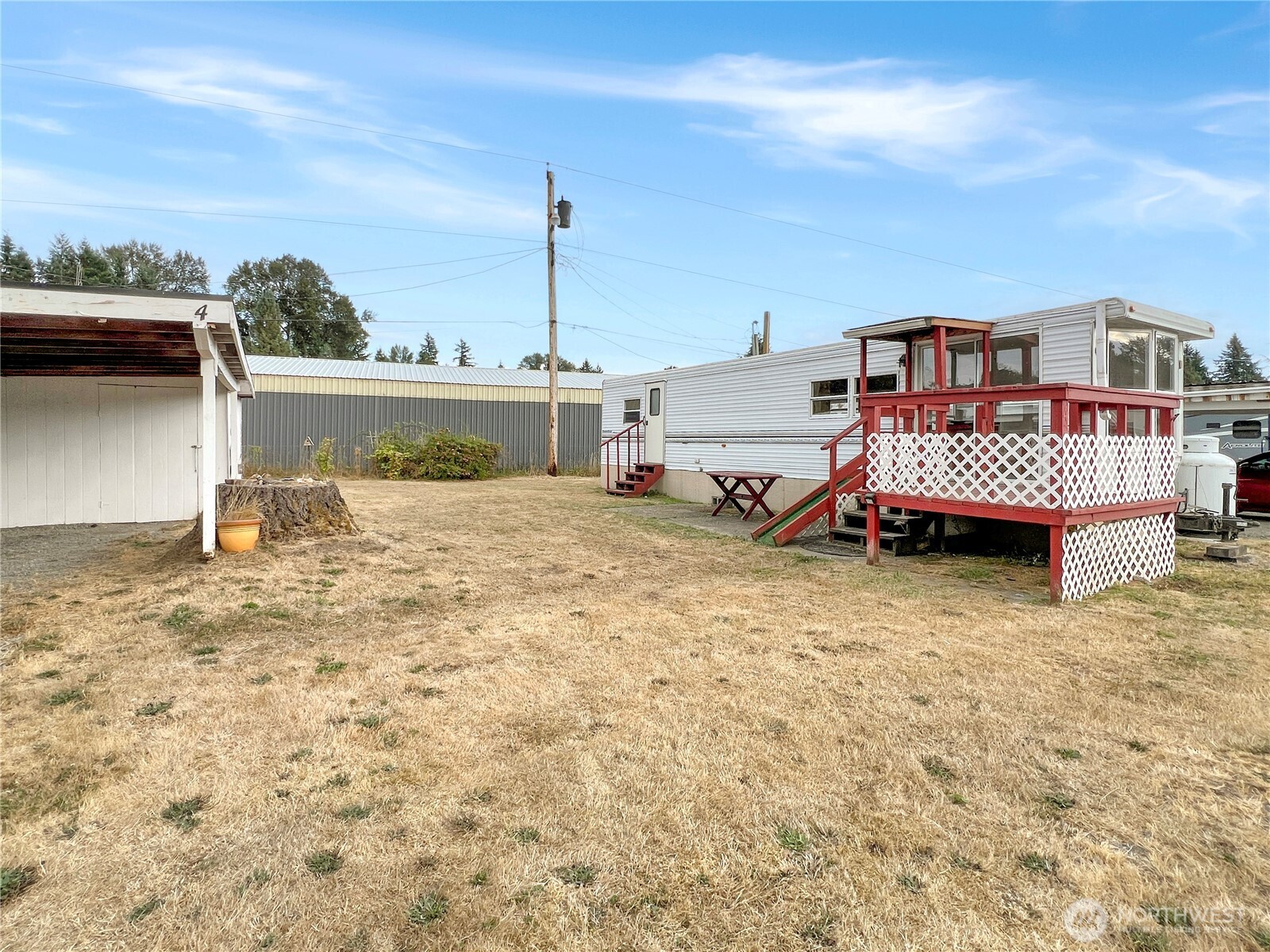 10900 Kuhlman Road Southeast, Unit 4 Olympia, WA 98513 - Photo 1 of 11 a bed room with a bed
