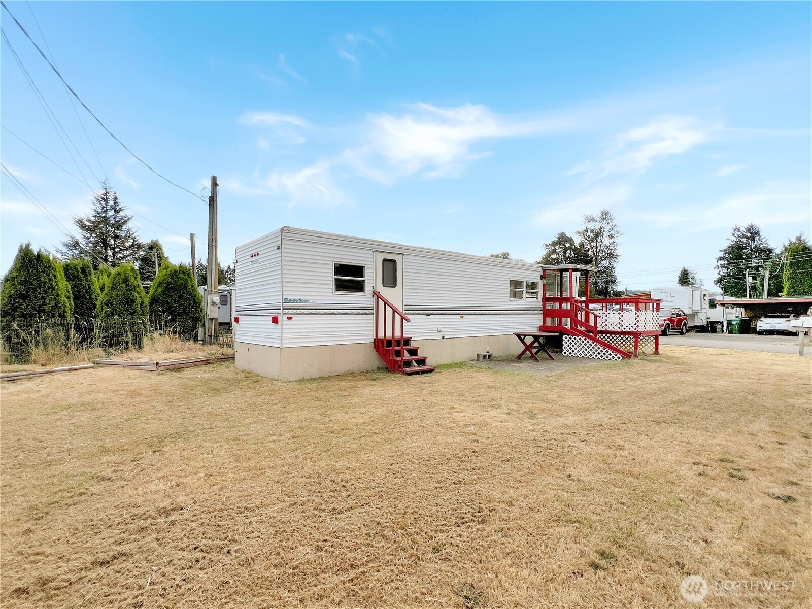 10900 Kuhlman Road Southeast, Unit 4 Olympia, WA 98513 - Photo 9 of 11 a view of a street with cars