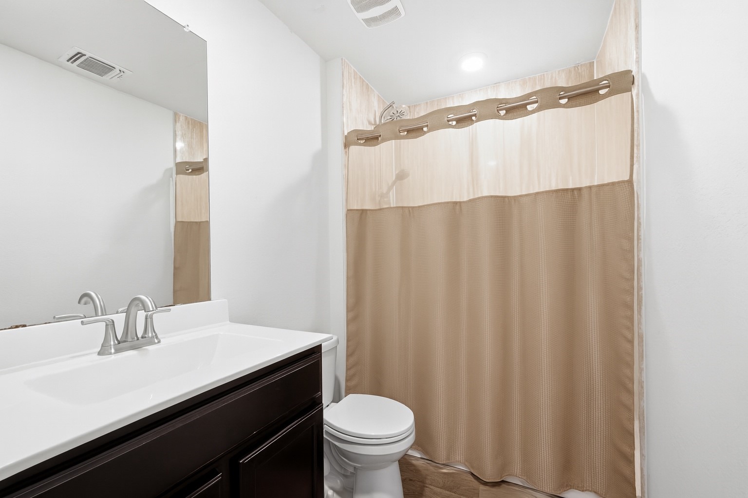 15000 Bajada Rd Manor Manor, TX 78653 - Photo 23 of 31 Functional bathroom featuring a vanity with a sink and a practical shower area.