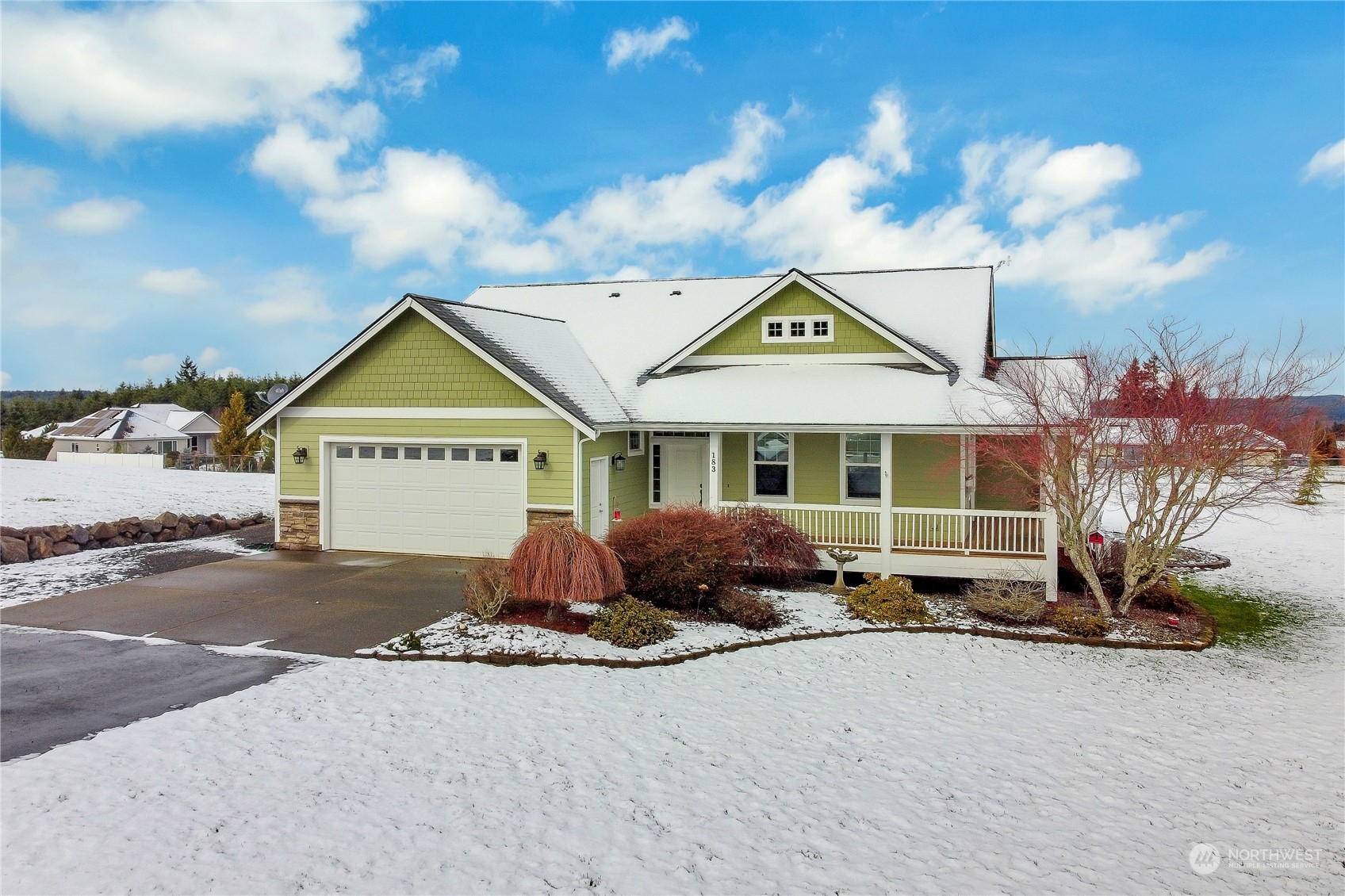 183 Garrett Loop Chehalis, WA 98532 - Photo 33 of 35 a front view of a house with a yard and garage