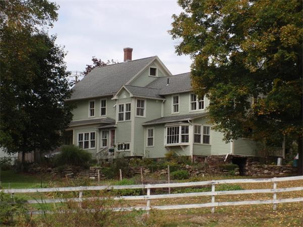 483 Montague Road Amherst, MA 01002 - Photo 23 of 30 front view of a house with a yard