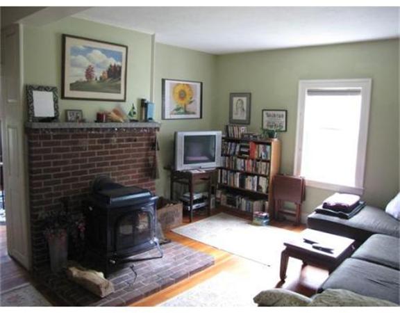 483 Montague Road Amherst, MA 01002 - Photo 9 of 30 a living room with furniture a rug and a window