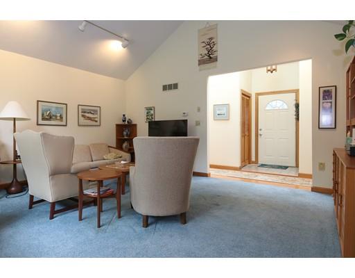7 Evergreen Lane Hanover, MA 02339 - Photo 11 of 20 a living room with furniture and a dining table