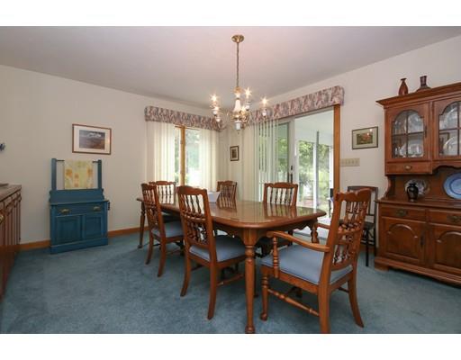 7 Evergreen Lane Hanover, MA 02339 - Photo 13 of 20 a view of a dining room with furniture and chandelier