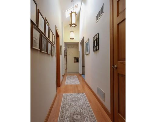 7 Evergreen Lane Hanover, MA 02339 - Photo 15 of 20 a view of a hallway with windows