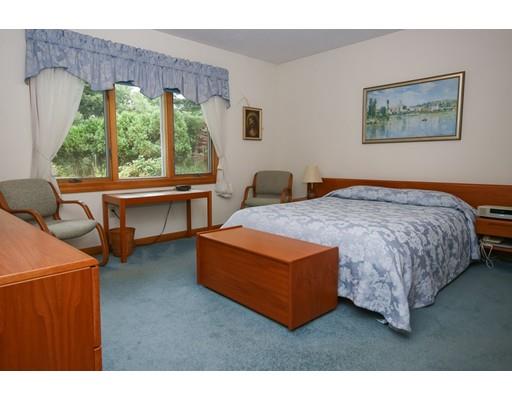 7 Evergreen Lane Hanover, MA 02339 - Photo 17 of 20 a bedroom with a bed and a large window
