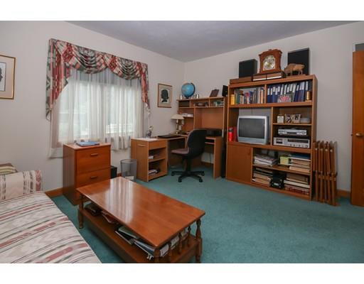 7 Evergreen Lane Hanover, MA 02339 - Photo 19 of 20 a room with furniture and a book shelf