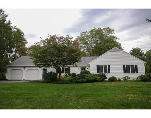 7 Evergreen Lane Hanover, MA 02339 - Photo 2 of 20 a front view of a house with a yard and trees