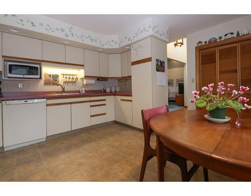 7 Evergreen Lane Hanover, MA 02339 - Photo 8 of 20 a kitchen with a table and chairs in it