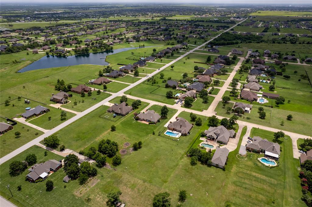 10044 Dennehy Drive Talty, TX 75126 - Photo 38 of 40 an aerial view of residential houses with outdoor space