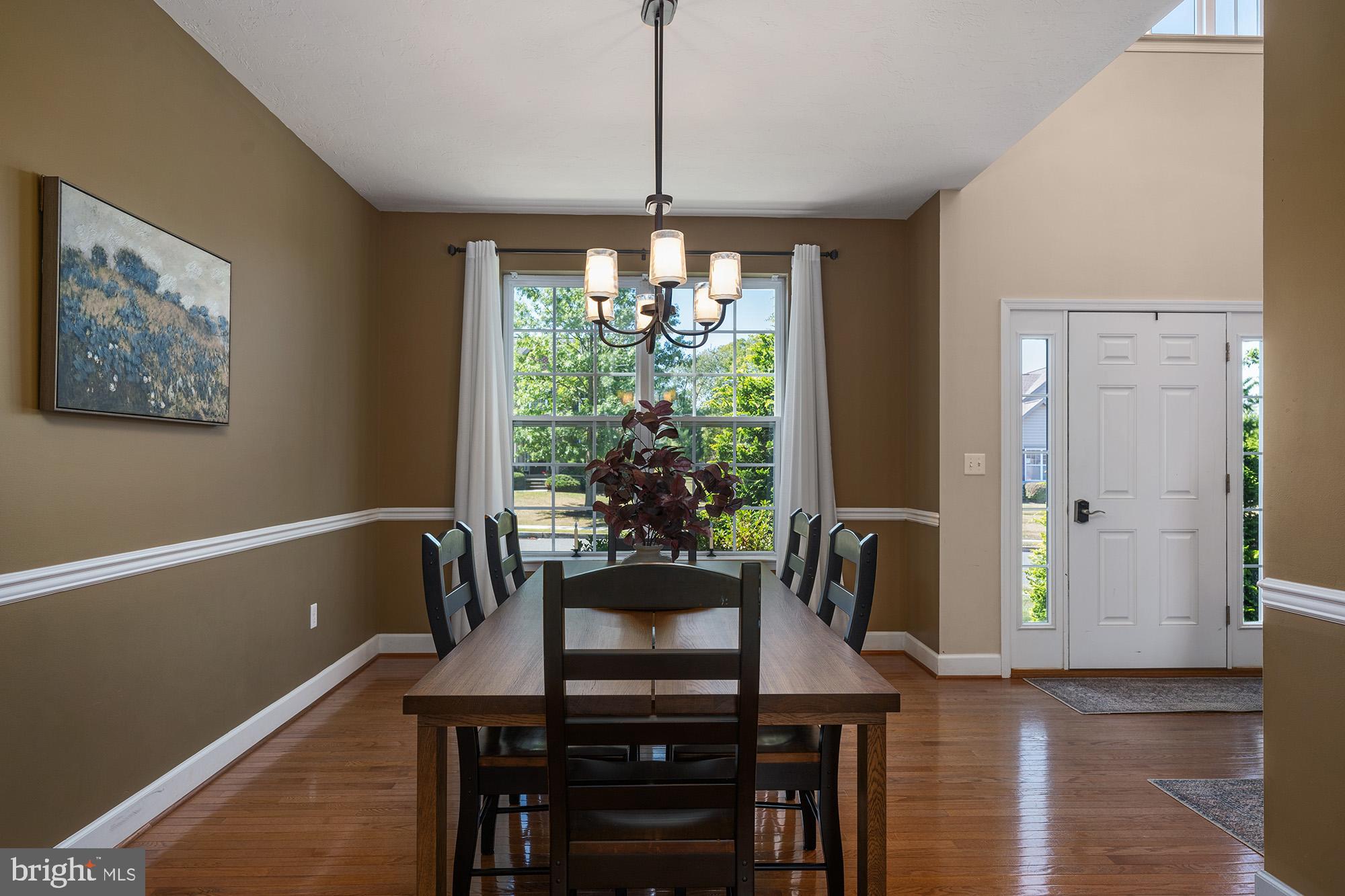 12 Boulder Road Hanover, PA 17331 - Photo 21 of 61 a view of a dining room with furniture window and wooden floor