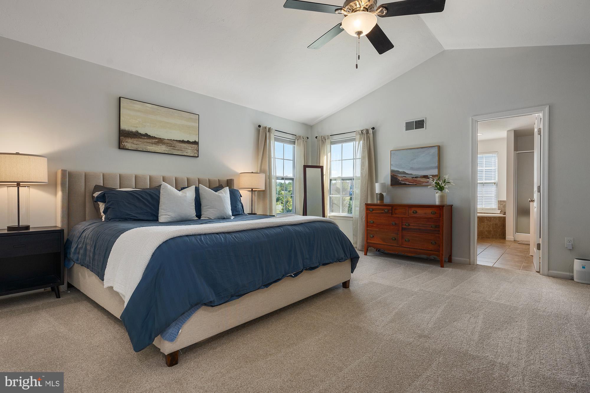 12 Boulder Road Hanover, PA 17331 - Photo 29 of 61 a spacious bedroom with a bed and a chandelier