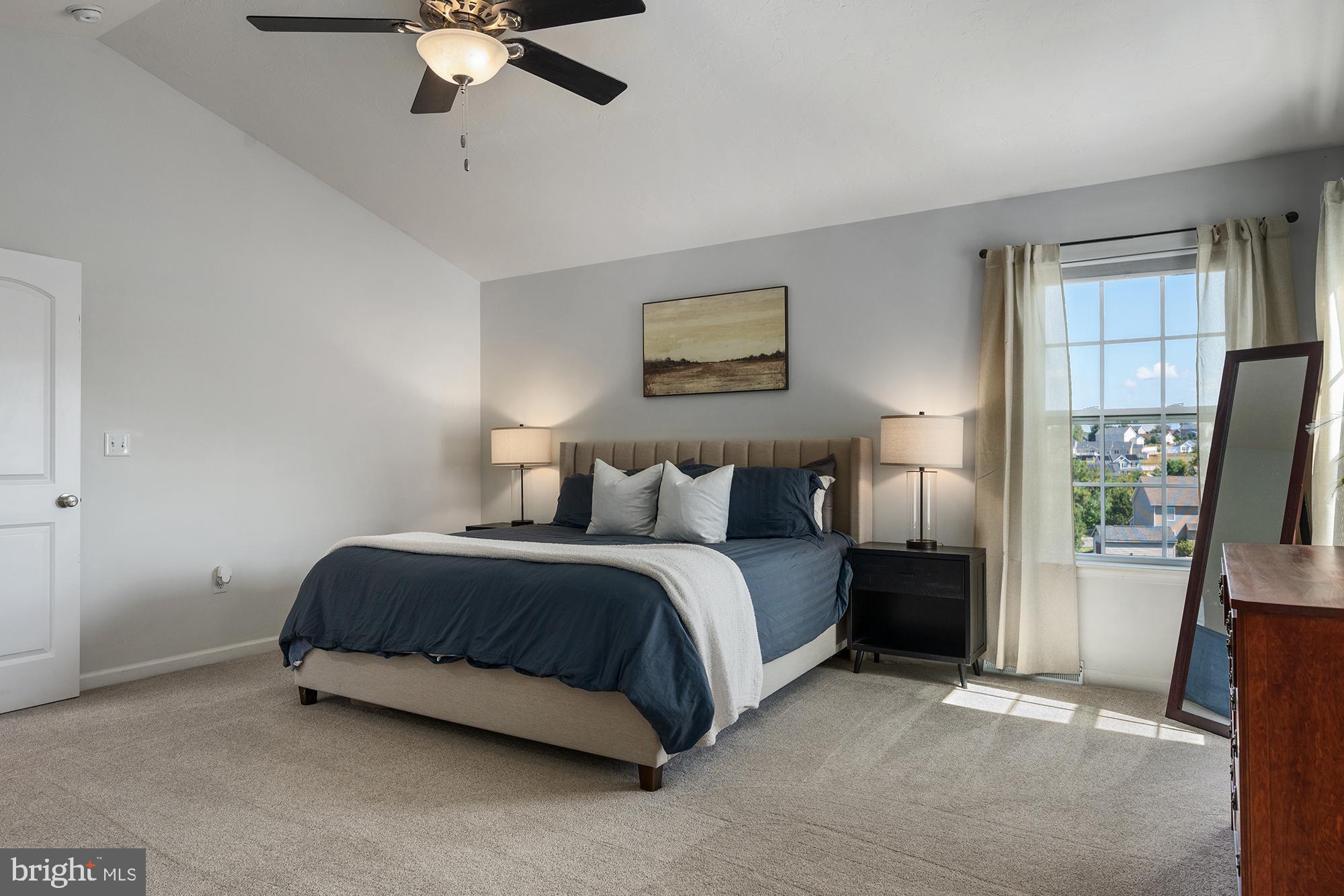 12 Boulder Road Hanover, PA 17331 - Photo 31 of 61 a spacious bedroom with a bed and a flat tv screen on dresser