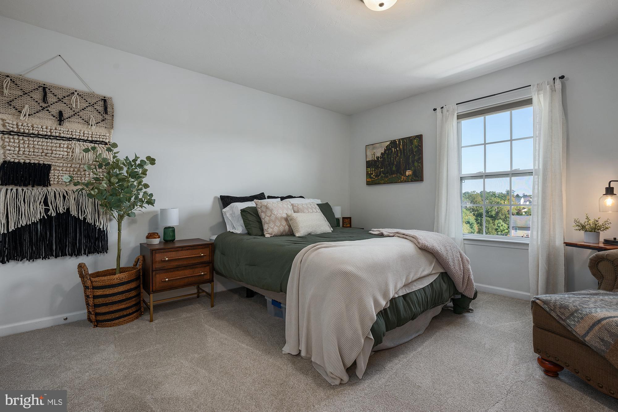 12 Boulder Road Hanover, PA 17331 - Photo 35 of 61 a spacious bedroom with a bed and a couch