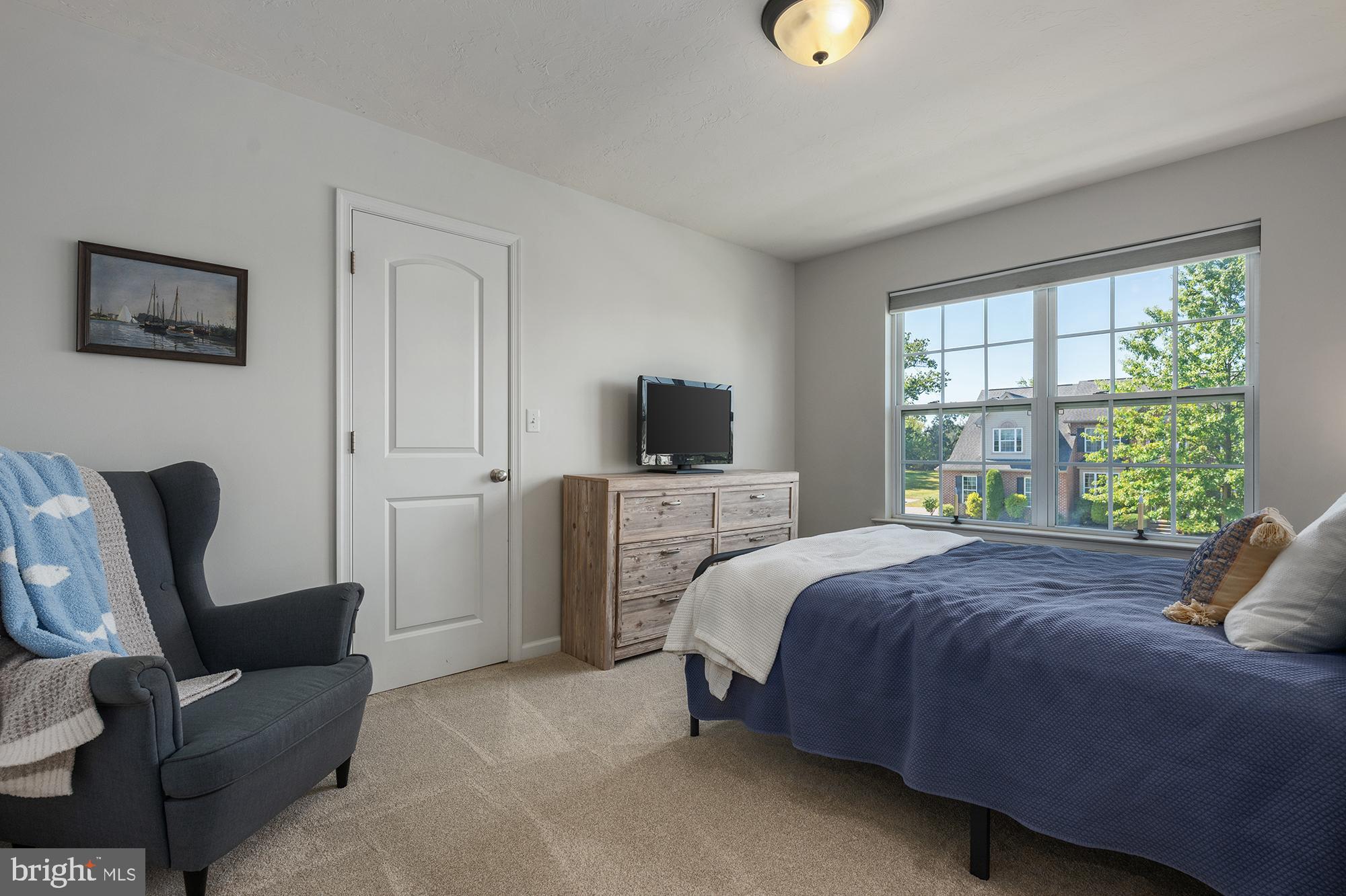 12 Boulder Road Hanover, PA 17331 - Photo 39 of 61 a bedroom with a bed a couch and a window