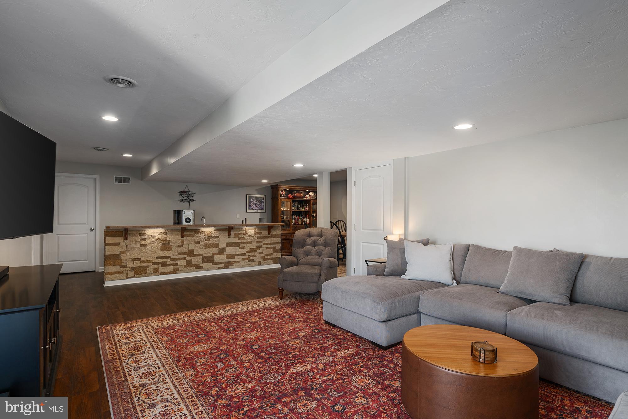 12 Boulder Road Hanover, PA 17331 - Photo 44 of 61 a living room with furniture and a flat screen tv