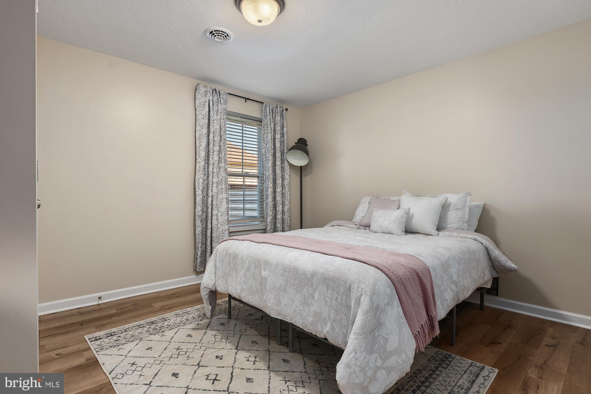 12 Boulder Road Hanover, PA 17331 - Photo 46 of 61 a bed sitting in a bedroom next to a window