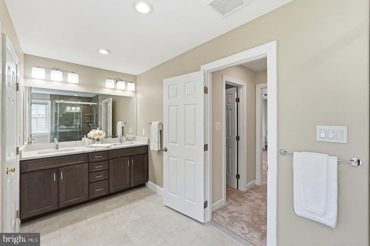 10816 Maplecrest Lane Potomac, MD 20854 - Photo 16 of 34 Primary renovated bathroom