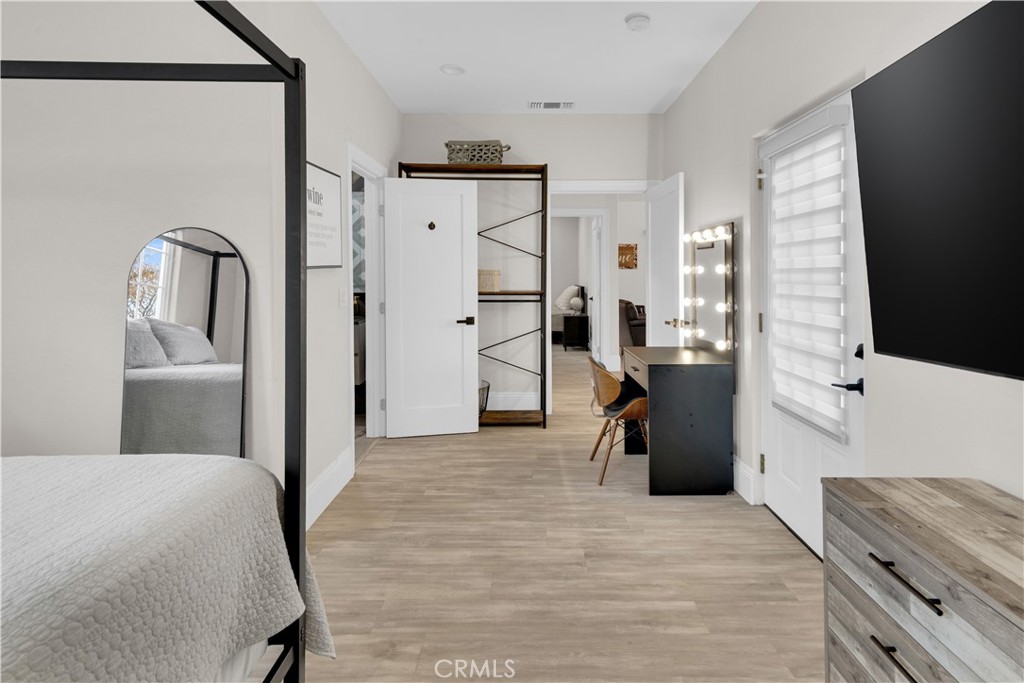 4295 Union Road Paso Robles, CA 93446 - Photo 18 of 27 a bedroom with a bed and a large mirror