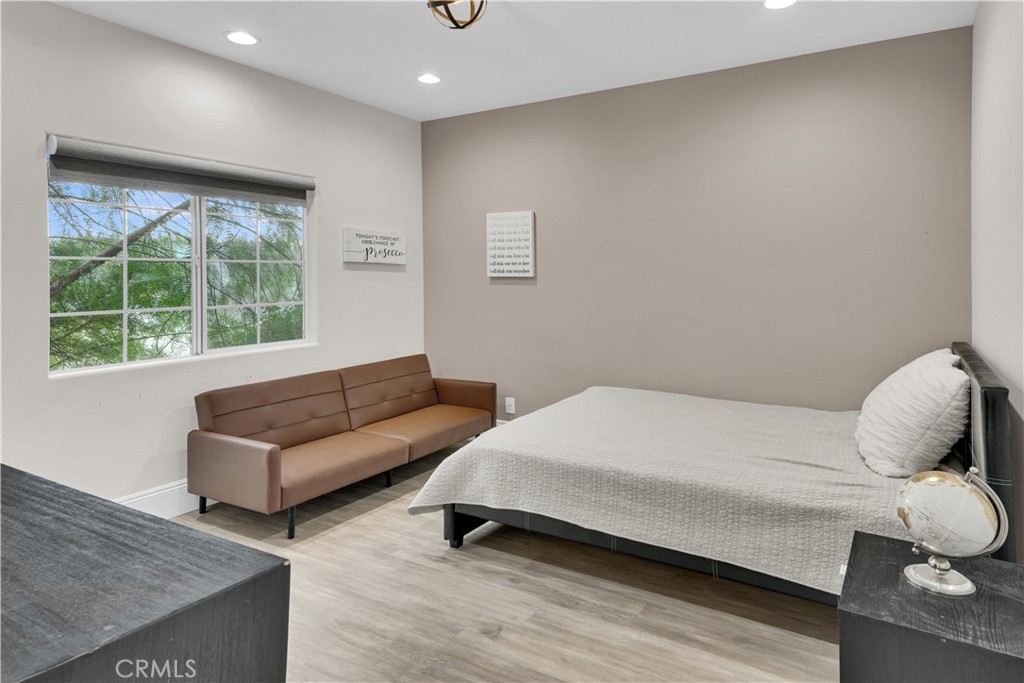 4295 Union Road Paso Robles, CA 93446 - Photo 21 of 27 a bedroom with a bed and a couch