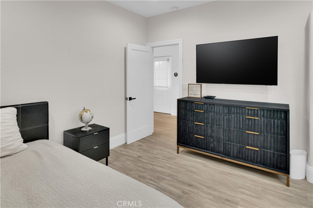 4295 Union Road Paso Robles, CA 93446 - Photo 22 of 27 a bedroom with a bed and a flat screen tv