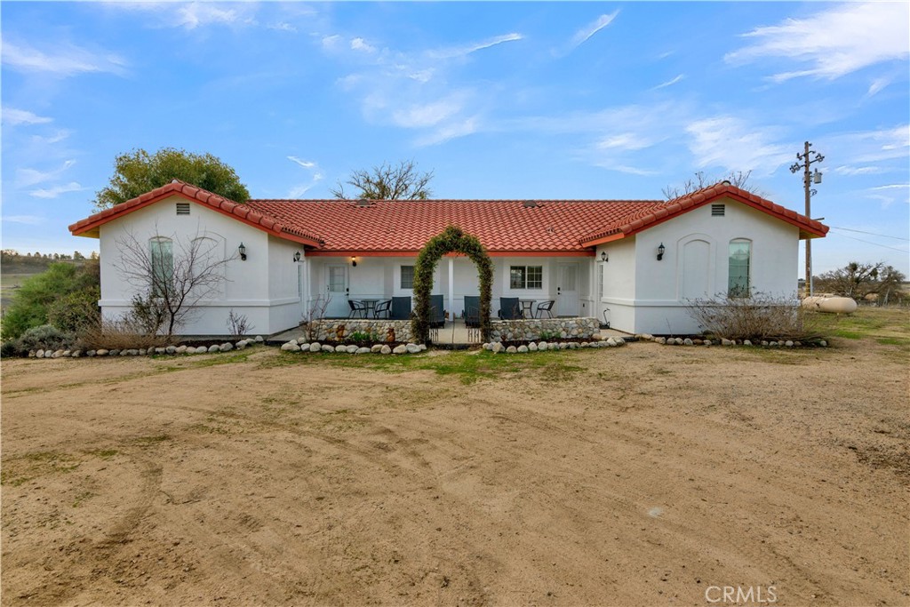 4295 Union Road Paso Robles, CA 93446 - Photo 2 of 27 a front view of a house with a yard