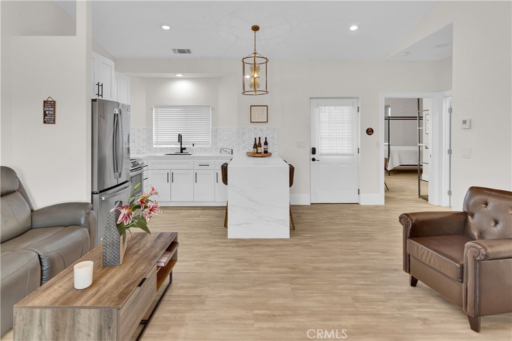 4295 Union Road Paso Robles, CA 93446 - Photo 3 of 27 a living room with furniture and kitchen view