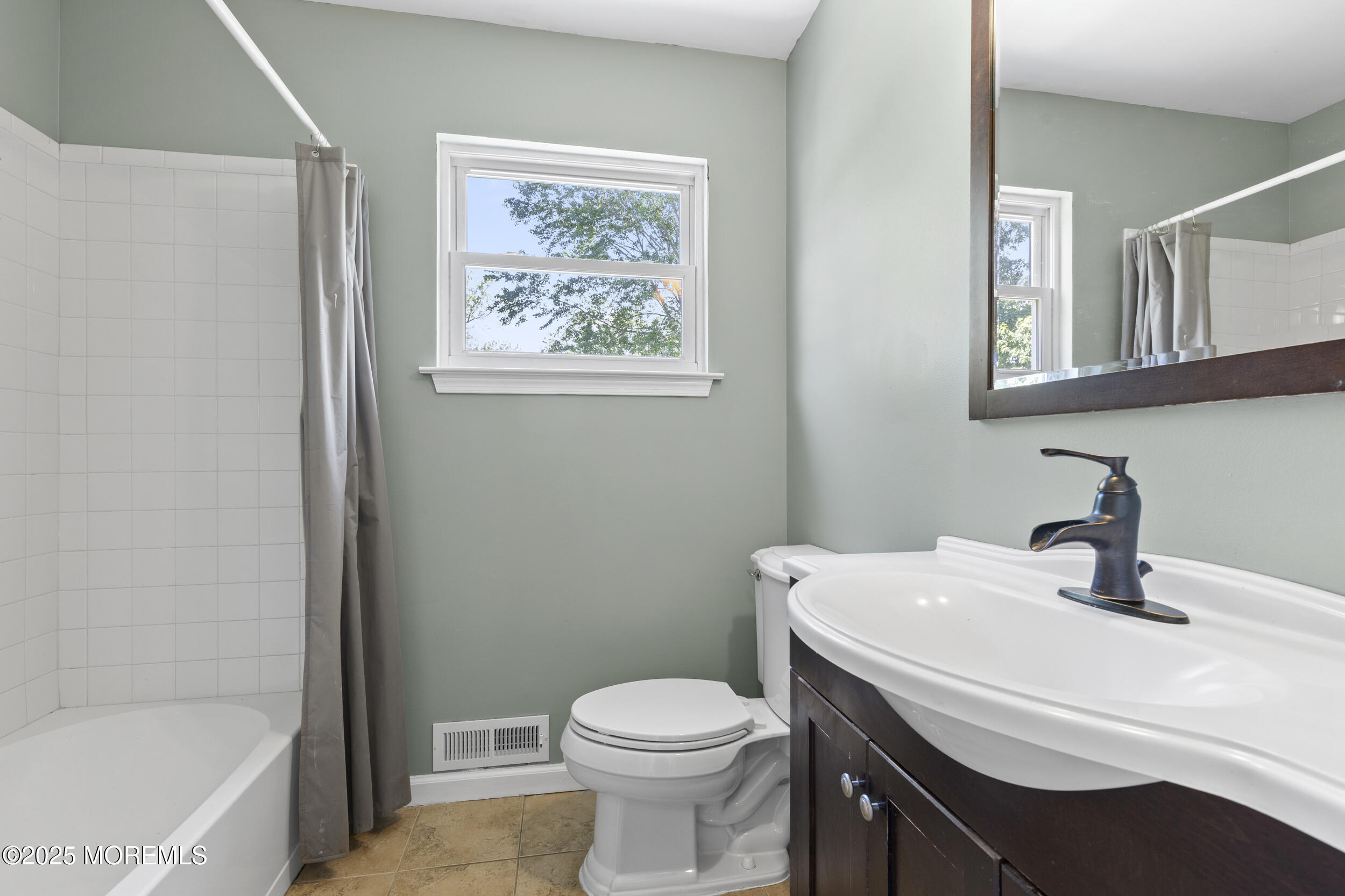 18 Hampton Road Howell, NJ 07731 - Photo 12 of 32 a bathroom with a sink toilet and a bathtub