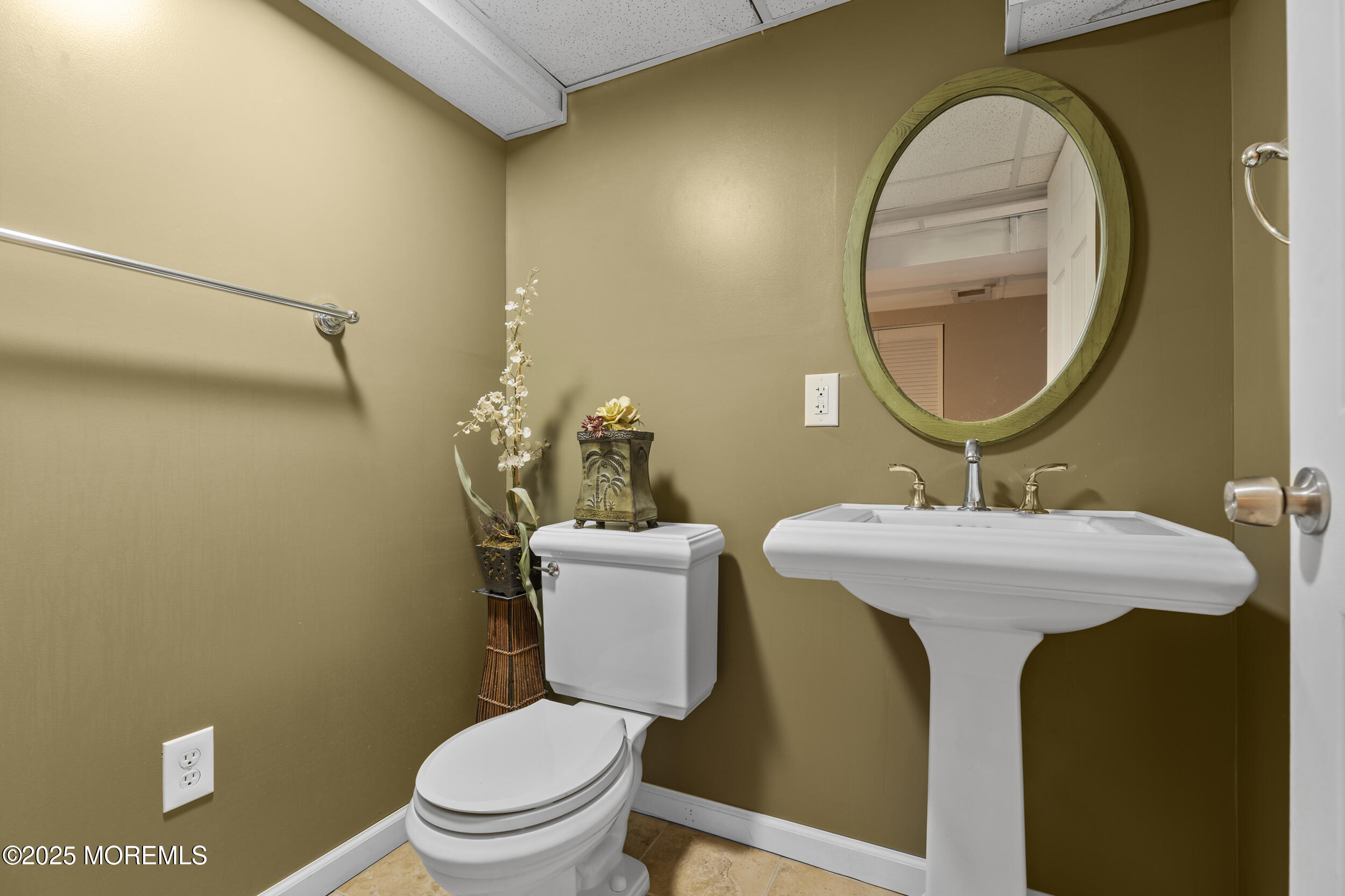 18 Hampton Road Howell, NJ 07731 - Photo 14 of 32 a bathroom with a toilet a sink and a mirror