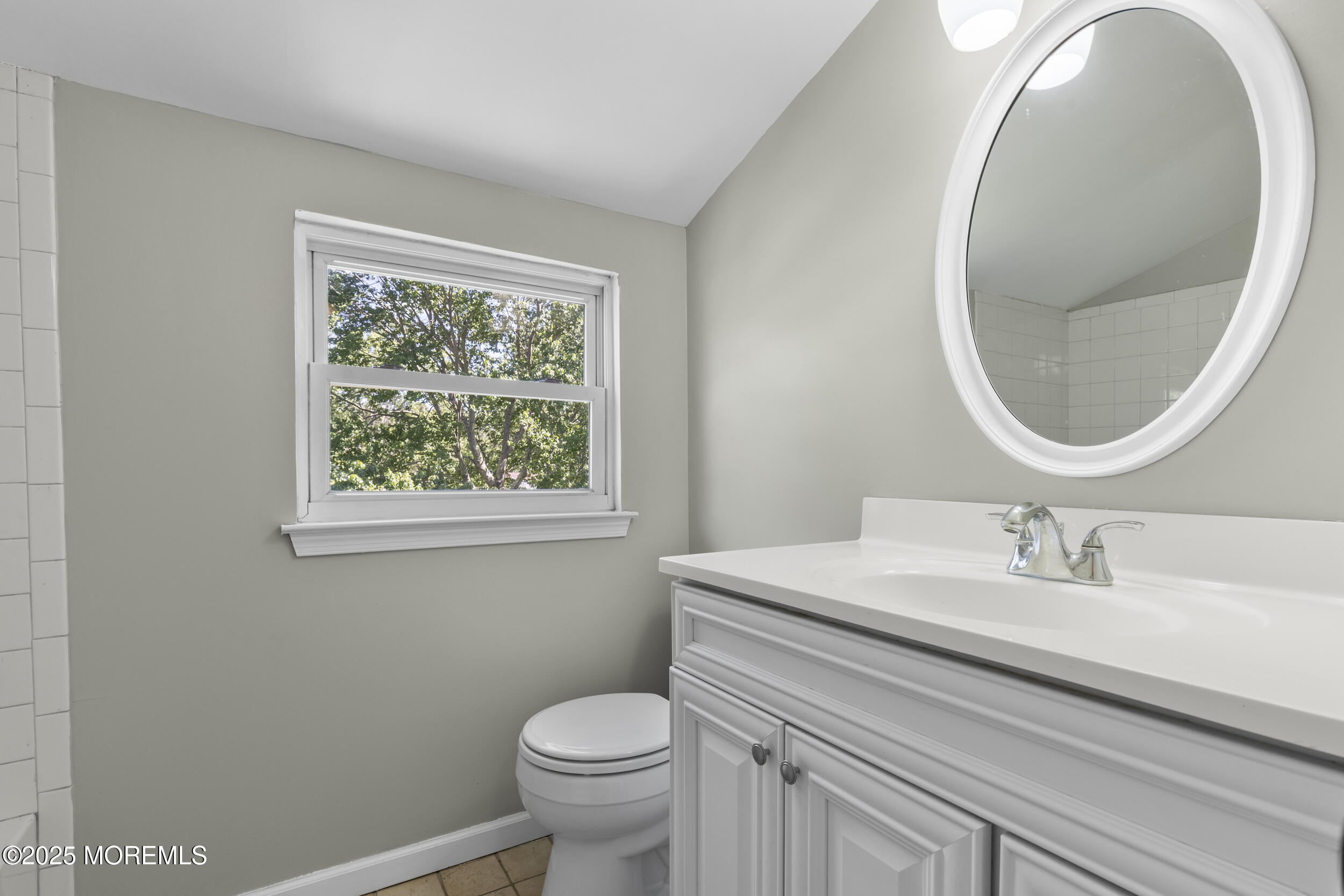 18 Hampton Road Howell, NJ 07731 - Photo 17 of 32 a bathroom with a sink a mirror and a toilet