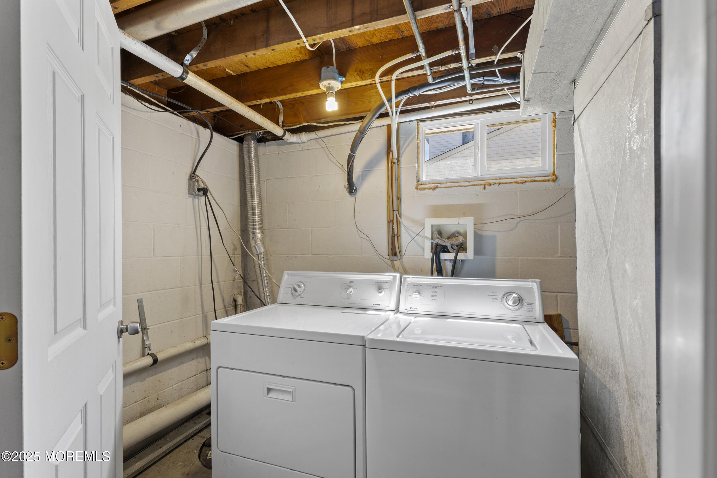 18 Hampton Road Howell, NJ 07731 - Photo 21 of 32 a utility room with dryer and washer