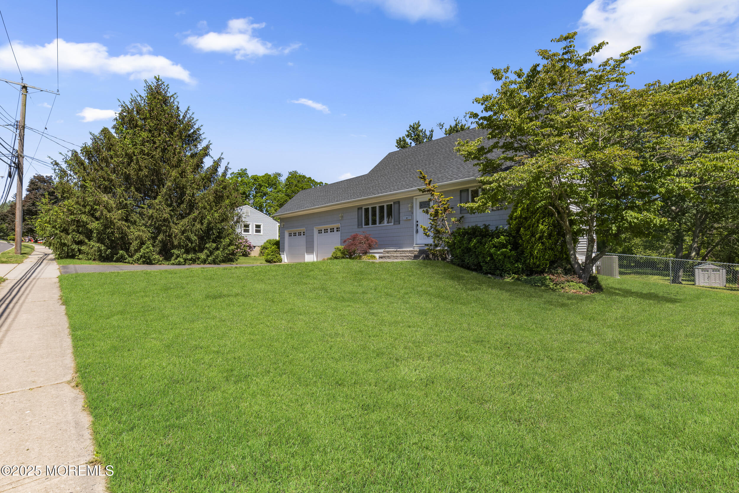 18 Hampton Road Howell, NJ 07731 - Photo 3 of 32 a view of house that has a yard