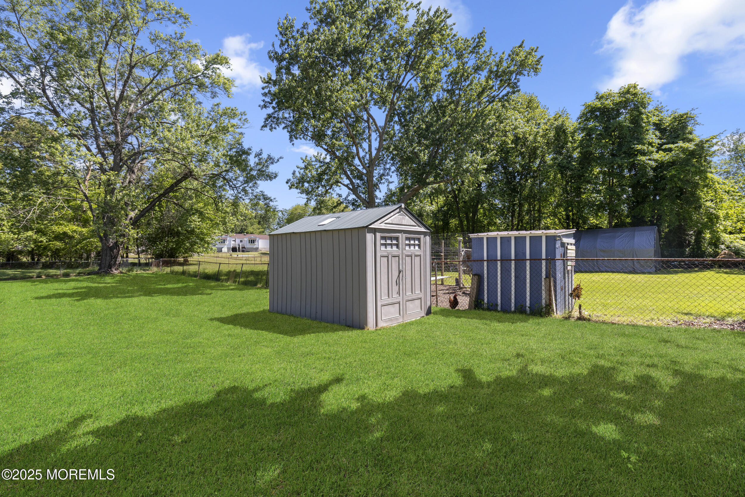 18 Hampton Road Howell, NJ 07731 - Photo 32 of 32 a view of a house with a big yard and large trees