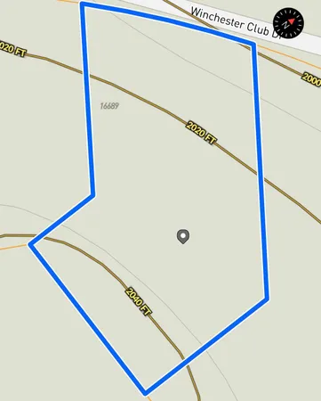 a view of a house with a yard and garden