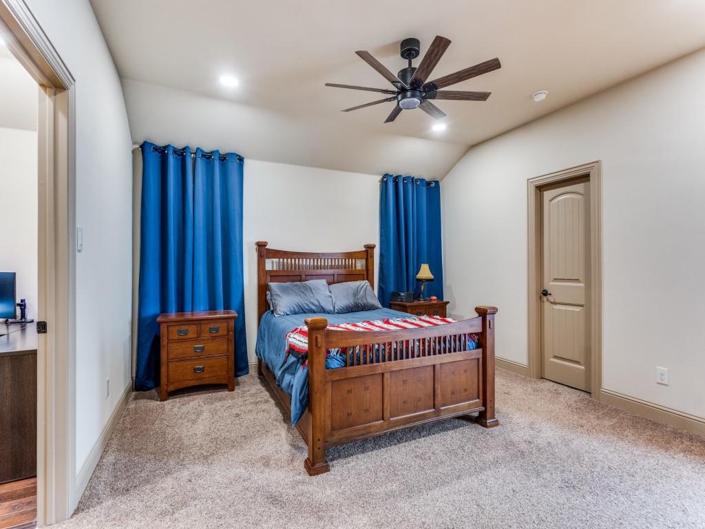 519 Gene Autry Lane Murphy, TX 75094 - Photo 14 of 25 Carpeted bedroom with lofted ceiling, a ceiling fan, and recessed lighting