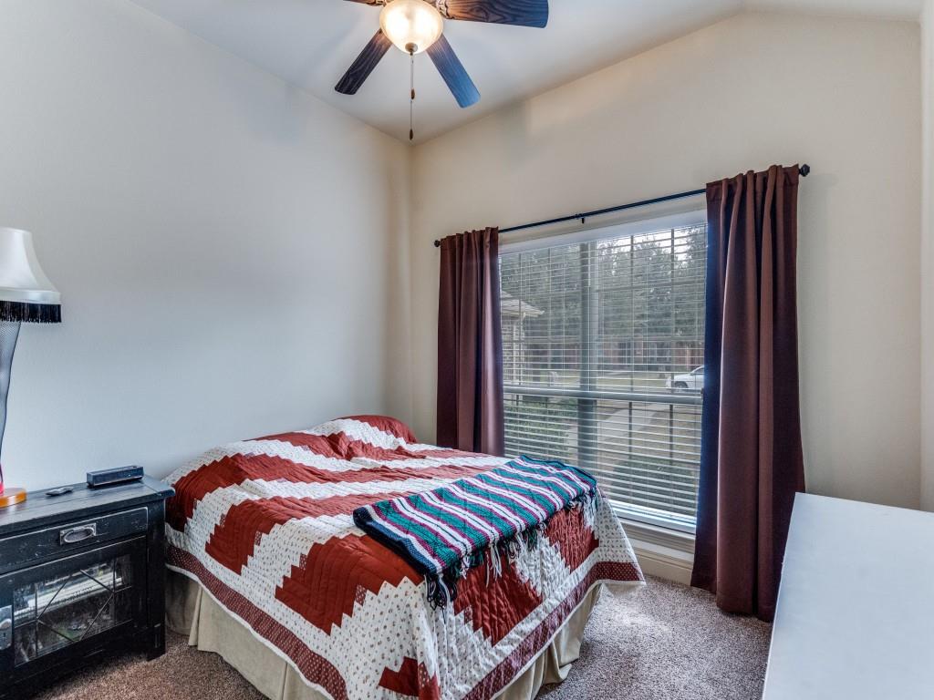 519 Gene Autry Lane Murphy, TX 75094 - Photo 19 of 25 Carpeted bedroom featuring ceiling fan