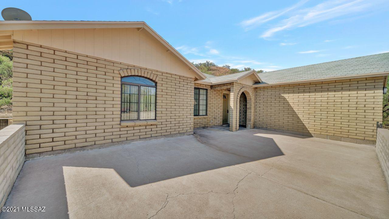 999 Circulo Golondrina Rio Rico, AZ 85648 - Photo 4 of 36 a front view of a house with windows